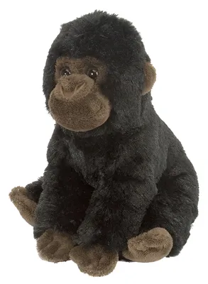 A plush toy gorilla sits on a white background.