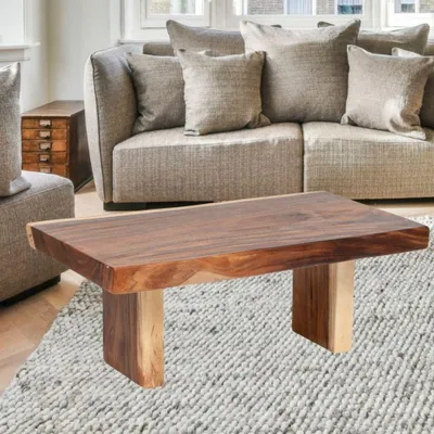 Produktbild von Massiver Unikat Couchtisch SUAR 120cm Natural Baumkante