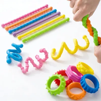 Produktbild von 12 Stück Fidget Toys Set Sensorik Spielzeug Ringe gegen Anti Stress