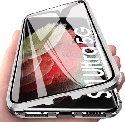 A hand holding a silver phone case with a clear front and back, showing the phone inside.
