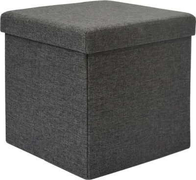 A studio shot of a dark gray fabric ottoman.
