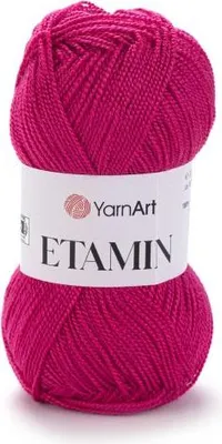 A ball of pink yarn with a white label.