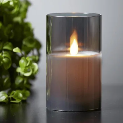 Produktbild von LED Kerze/Windlicht 'Twinkle' - Echtwachs - mechanische Flamme - Timer - H: 10cm - rauchschwarz