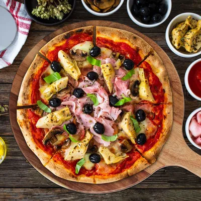 Immagine prodotto di Tagliere per pizza in legno di acacia con manico, grande