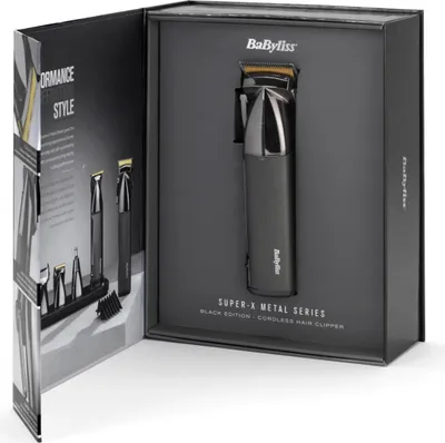 A black box packaging for a hair clipper, with the product displayed inside.