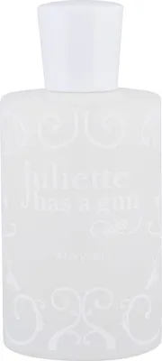 A white bottle of perfume with decorative white swirls and text.