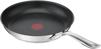 A close-up, studio shot of a frying pan against a white background.