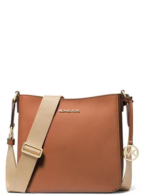 Produktbild von Michael Kors kleine Umhängetasche aus Leder, ideal für Reiseutensilien