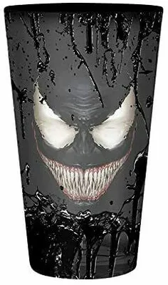 A close-up of a glass with a Venom design.