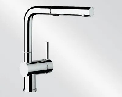 A chrome kitchen faucet with a pull-out spout against a gradient background.