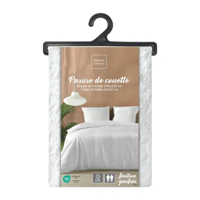 The image shows the packaging of a duvet cover set, with a visual representation of the product on the packaging.