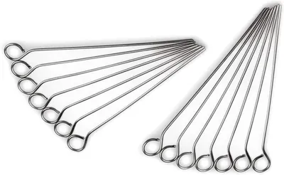 A set of stainless steel skewers arranged in two groups on a white background.