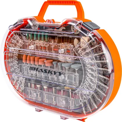 A clear, well-lit studio shot of a multi-tool accessory kit in its clear plastic case.