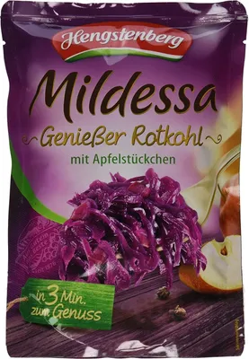 A pouch of red cabbage with apple pieces, presented on a wooden surface.