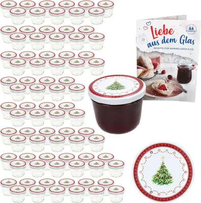 A set of small glass jars with lids, a jar filled with jam, and a recipe booklet, all with a Christmas theme.