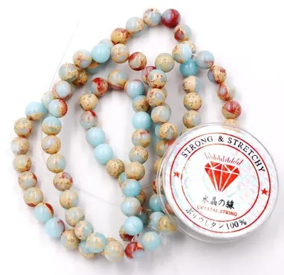 Image de Perles d'agalmatolite bleues de 8 mm pour bijoux