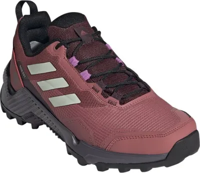 A single Adidas Terrex AX4 women's hiking shoe is shown from a three-quarter side view against a white background.