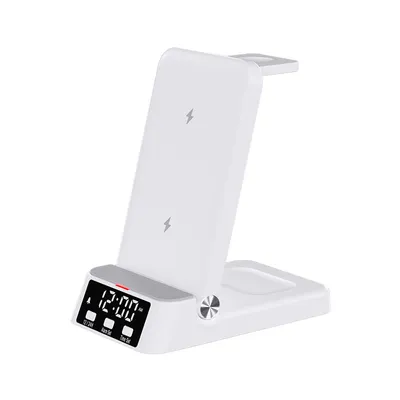 A white 4-in-1 wireless charging station with a digital clock.