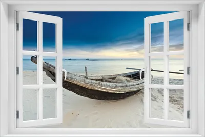 Produktbild von Wallario Wandbild aus Acryl, 60 x 90 cm, freischwebende Optik - Fischerboot am Strand mit Sonnenuntergang mit Fenster-Illusion