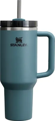 A teal Stanley Quencher H2.0 Flowstate tumbler with a straw and handle, isolated on a white background.