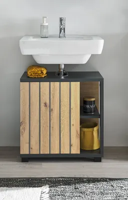 A bathroom vanity cabinet with a sink installed above it.