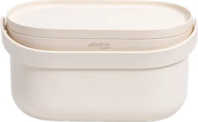 A clean, studio shot of an ivory-colored compost bin.