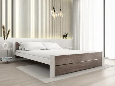 A modern bedroom with a white and wood-grain bed frame.