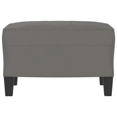 A front view of a dark gray ottoman on a white background.