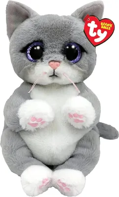 A plush toy cat with large, sparkly purple eyes and a red "ty" heart-shaped tag.