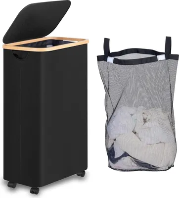 A black laundry basket with a wooden rim and lid, shown next to a mesh laundry bag filled with clothes.