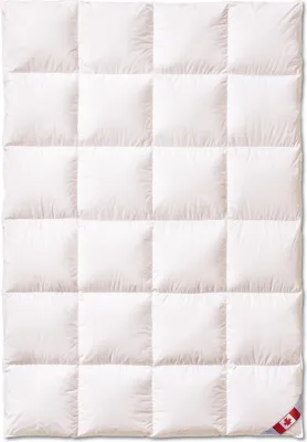 A white down comforter is laid flat, showing its quilted pattern.