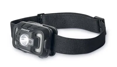 A black Philips LED headlamp with an adjustable strap is shown against a white background.