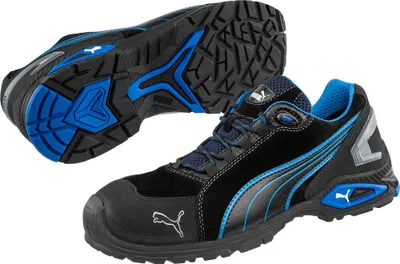 A pair of black and blue Puma safety shoes, with one shoe shown from the side and the other from the sole.