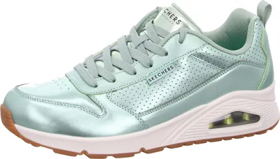 A single green sneaker is shown from the side against a white background.