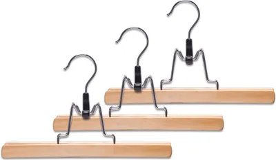 Three wooden hangers with metal clips and hooks are displayed against a white background.