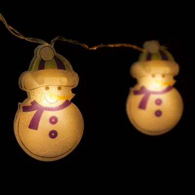 Immagine prodotto di Catena luminosa a LED - Pupazzo di neve - 10 LED - 1,35 metri - Luce bianco caldo - Alimentazione: 2 batterie AA