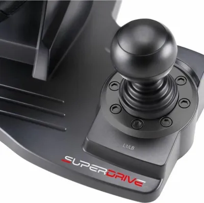 A close-up view of a gaming steering wheel's joystick and gear shifter.