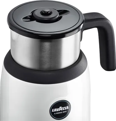A close-up view of a white and silver milk frother with a black lid and handle.