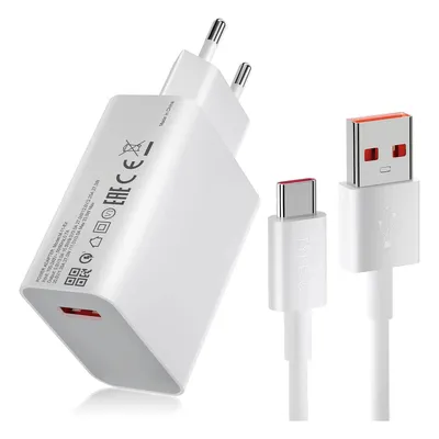 A white Xiaomi 33W USB-A charger with a white USB-C cable is displayed on a white background.