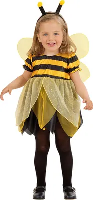 A young girl wearing a bee costume.