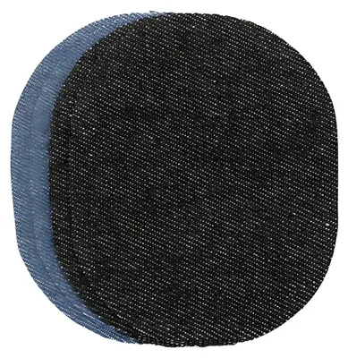 A stack of circular denim patches.
