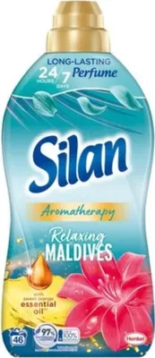 A bottle of Silan Aromatherapy fabric softener with a floral design.