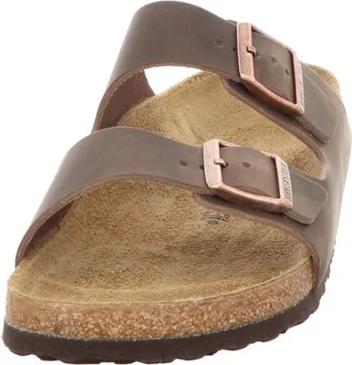 A close-up view of a brown Birkenstock sandal.