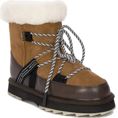 A single brown boot with white fur trim and black and white laces is shown against a white background.