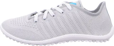 A side view of a gray athletic shoe against a white background.