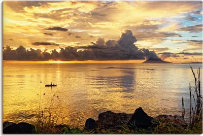 Produktbild von ARTland Leinwandbild Sonnenuntergang mit einem Boot Größe: 120x80 cm