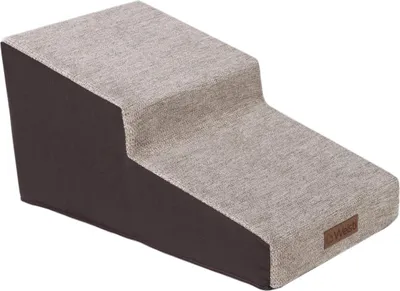 A two-step pet stair with a beige fabric surface and dark brown sides, shown against a white background.