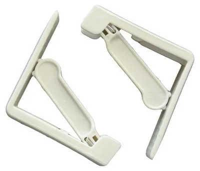 Image de Pinces Nappe Ressort Blanches Maintien Stable Et Discret De Nappe - Exma
