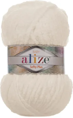 A ball of cream-colored yarn with a label.