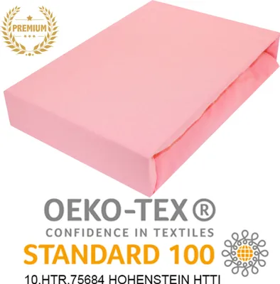 A pink fitted sheet is shown on a white background, with several certification logos and text overlays.
